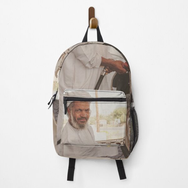 Item preview, Man in Oman filling up car at gas station designed and sold by Photopat.