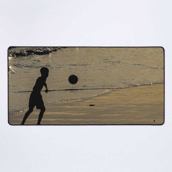 Item preview, Child Playing Football in Golden Hour Silhouette at Ondina Beach Salvador designed and sold by ThaCriações.