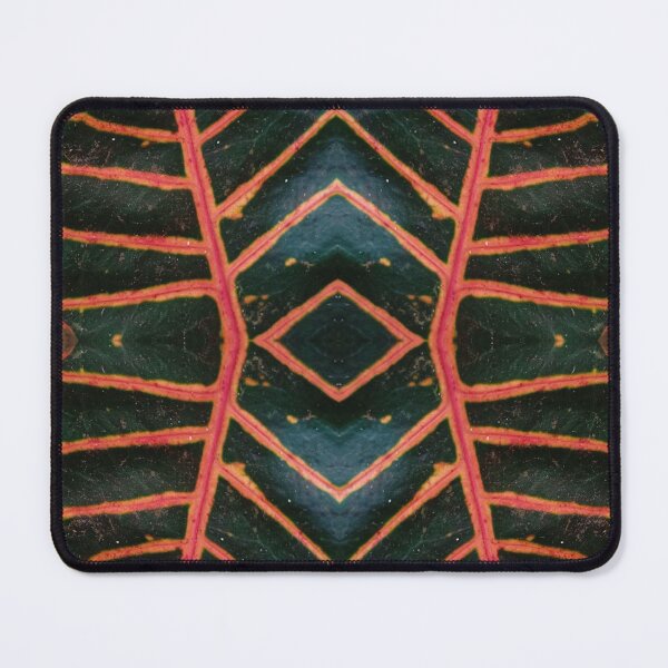 Item preview, Dark green plant with orange-red veins, mirror image designed and sold by lyloubeaupere.