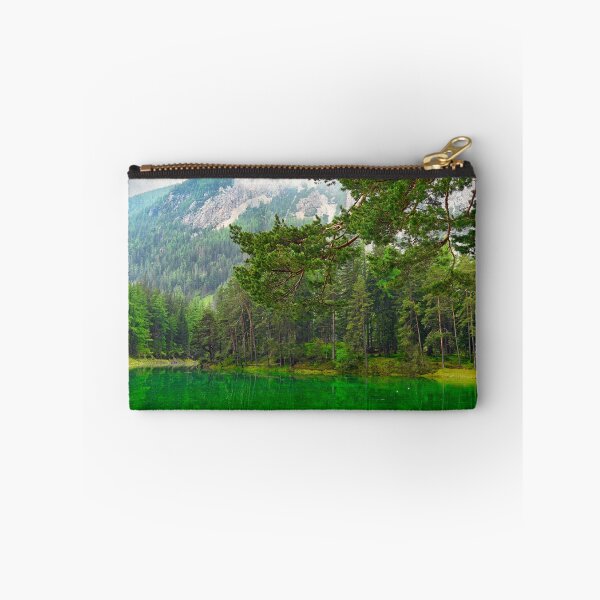Item preview, Vibrant emerald green water of Grüner See lake in Styria Austria with pine forest and mountains designed and sold by goceris.