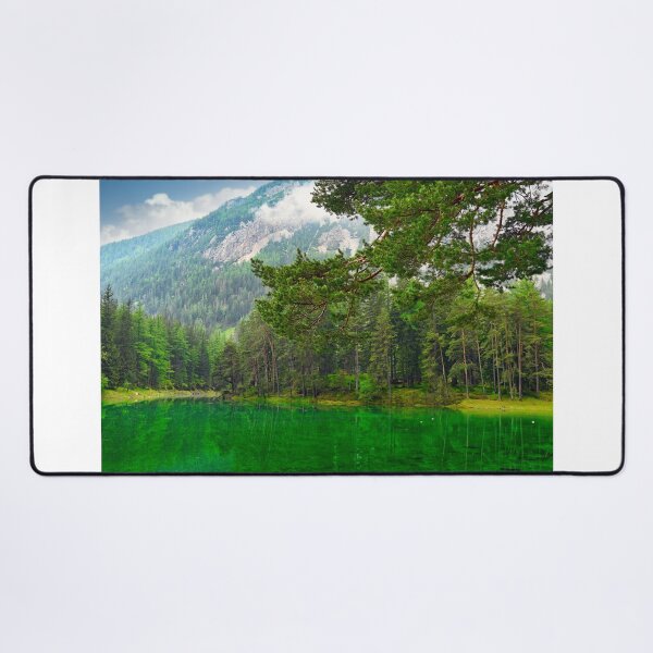 Item preview, Vibrant emerald green water of Grüner See lake in Styria Austria with pine forest and mountains designed and sold by goceris.