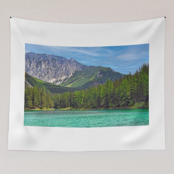 Item preview, Turquoise water of Gruner See lake with Hochschwab mountain range and pine forest in Austria designed and sold by goceris.