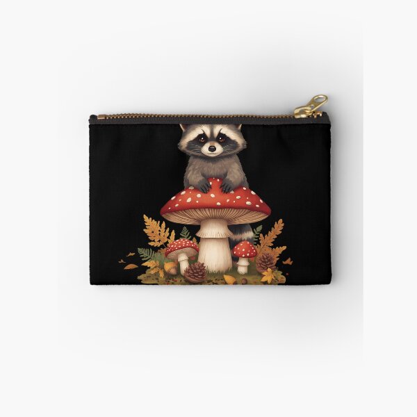 Item preview, Cute Raccoon on Amanita Mushroom Dark Cottagecore Goblincore Sticker designed and sold by Youram.