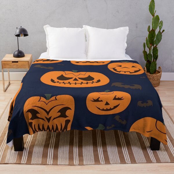 Item preview, Spooky Halloween Seamless Pattern with Carved Jack-o'-Lanterns and Bats designed and sold by interdesigner.