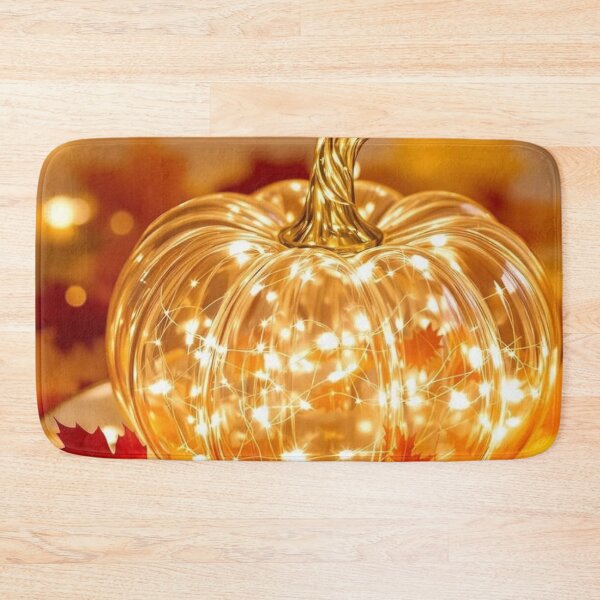 Item preview, Glowing Glass Pumpkin with Fairy Lights — Cozy Autumn Bokeh Print designed and sold by LYAN-STORE.