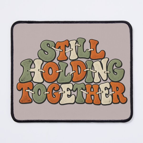 Item preview, Still Holding Together – Funny Visible Mending Design designed and sold by Golden Era Studio.