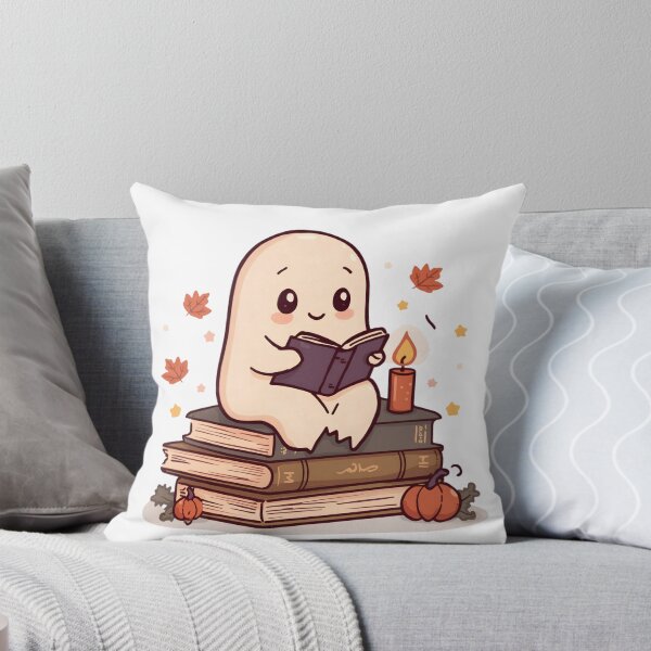 Item preview, Cozy Ghost Reading Sticker – Cute Bookish Ghost on Old Books with Candle & Pumpkins, Fall Halloween Book Lover Sticker designed and sold by abdelski.