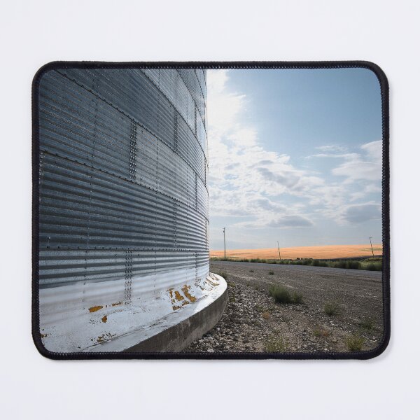 Item preview, Vertical of side of grain bin with sunny sky in the distance designed and sold by lisavonbiela.