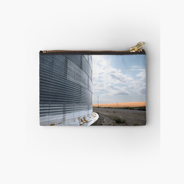 Item preview, Vertical of side of grain bin with sunny sky in the distance designed and sold by lisavonbiela.