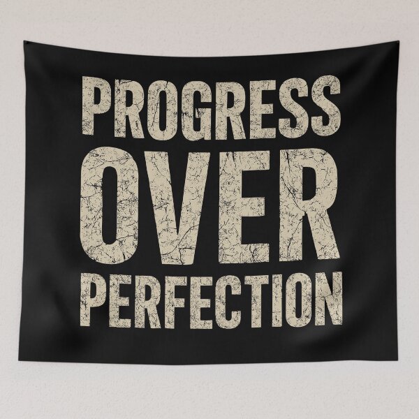 Item preview, Inspiring Progress Over Perfection Graphic Unisex Shirt designed and sold by ThreadQuirk.