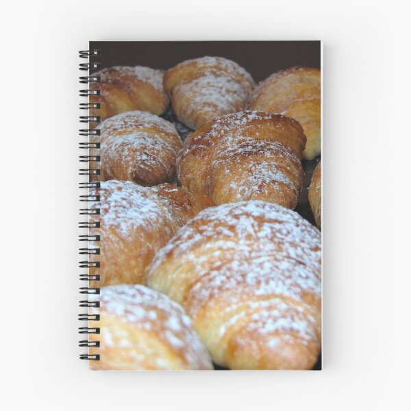 Item preview, Italian croissants sprinkled with icing sugar on a shiny black surface, background. designed and sold by ollgast5.