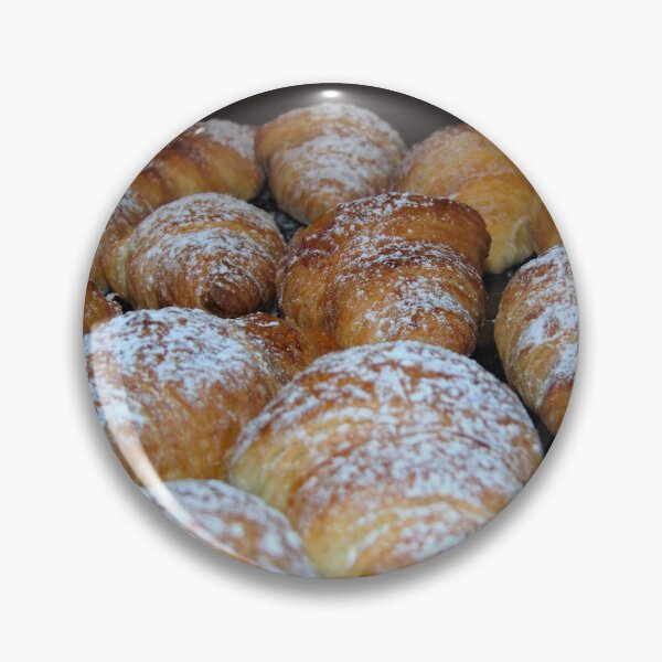 Item preview, Italian croissants sprinkled with icing sugar on a shiny black surface, background. designed and sold by ollgast5.