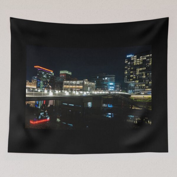 Item preview, Düsseldorf Media Harbour at night with light bridge and reflection of the city lights designed and sold by Your Happy Life.