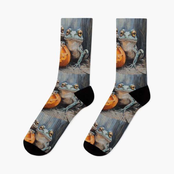 Artikelvorschau, Drei gruselig-niedliche Frösche mit Kürbislaterne – Vintage-Halloween-Tierkunst entworfen und verkauft von elisarasada.