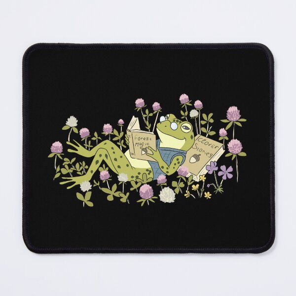 Item preview, Frog Lying in Clover Field Reading Forest Magic Books Cottagecore Art designed and sold by LeshanArt.