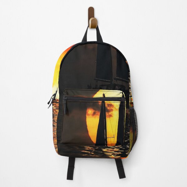 Item preview, Moonlit Sailing – Sailboat Silhouette on a Golden Sea designed and sold by Exodoi.