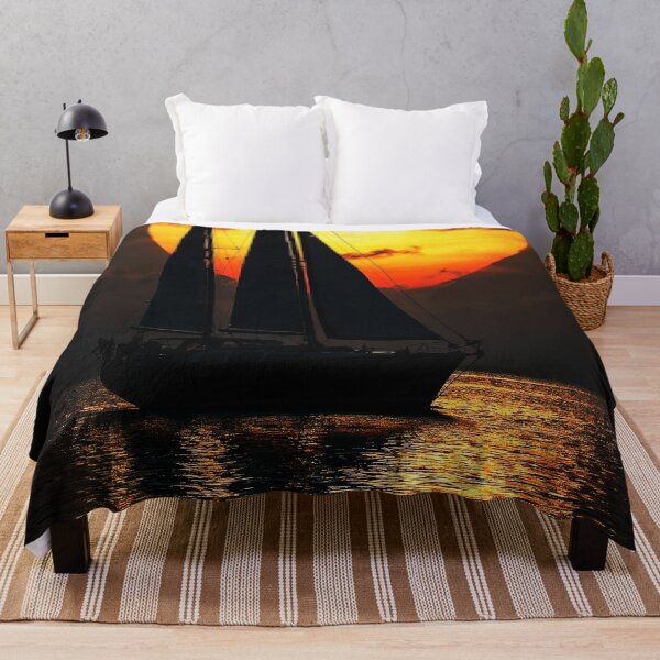 Item preview, Moonlit Sailing – Sailboat Silhouette on a Golden Sea designed and sold by Exodoi.
