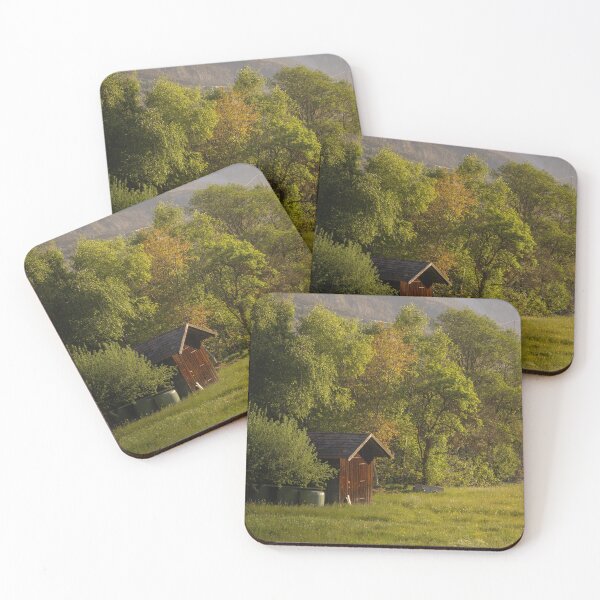 Item preview, Wooden Cabin In Meadow Near Mountain Slope At Sunset designed and sold by Mylieton.