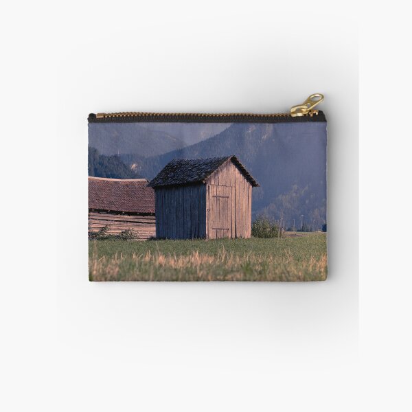 Item preview, Rustic Wooden Barns In Meadow With Mountain Range designed and sold by Mylieton.