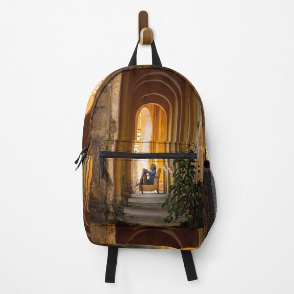Item preview, Person Sitting In Armchair Inside Arched Hallway designed and sold by Mylieton.