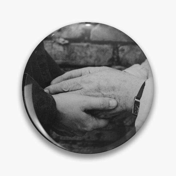 Item preview, Close Up Of Two People Holding Hands Against Brick Wall designed and sold by Kylodt.