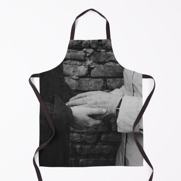 Item preview, Close Up Of Two People Holding Hands Against Brick Wall designed and sold by Kylodt.