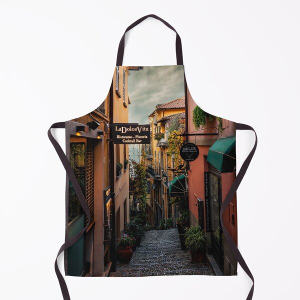 Item preview, Narrow Cobblestone Alley With Restaurant Signs In Italian Town designed and sold by Maveryc.