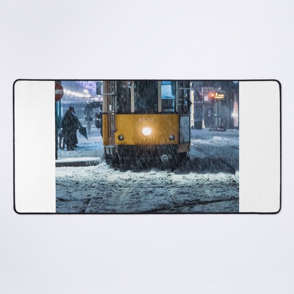 Item preview, Classic Yellow Tram Navigating Through Heavy Snowstorm In City designed and sold by Francisera.