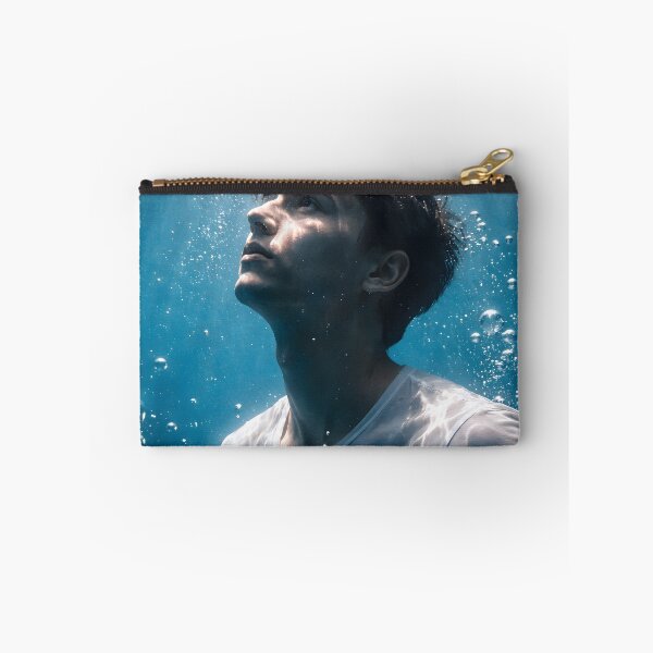 Item preview, Young man submerged underwater looking up toward light designed and sold by homydesign.