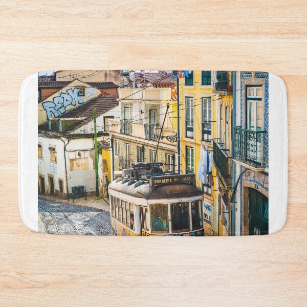 Item preview, Yellow Vintage Tram Driving On Narrow Lisbon Street    designed and sold by Christorn.