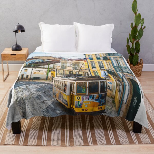 Item preview, Yellow Vintage Tram Driving On Narrow Lisbon Street    designed and sold by Christorn.