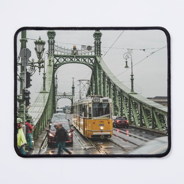 Item preview, Yellow Tram Crossing Historic Green Steel Bridge In City designed and sold by Christorn.