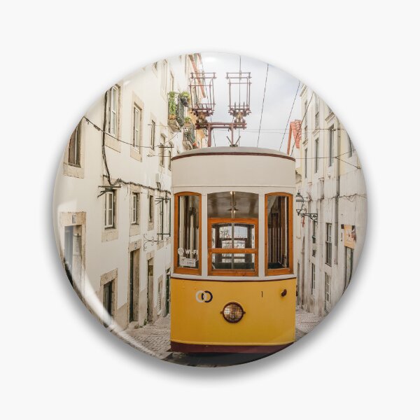 Item preview, Yellow Vintage Tram Ascending Steep Cobblestone Street In Lisbon designed and sold by Laughline.