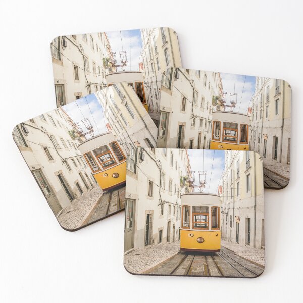 Item preview, Yellow Vintage Tram Ascending Steep Cobblestone Street In Lisbon designed and sold by Laughline.