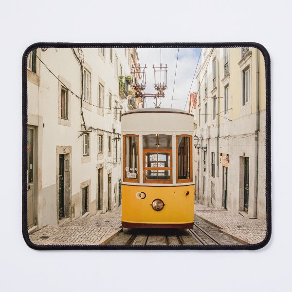 Item preview, Yellow Vintage Tram Ascending Steep Cobblestone Street In Lisbon designed and sold by Laughline.