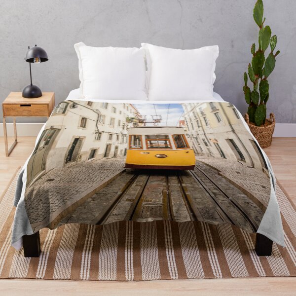 Item preview, Yellow Vintage Tram Ascending Steep Cobblestone Street In Lisbon designed and sold by Laughline.