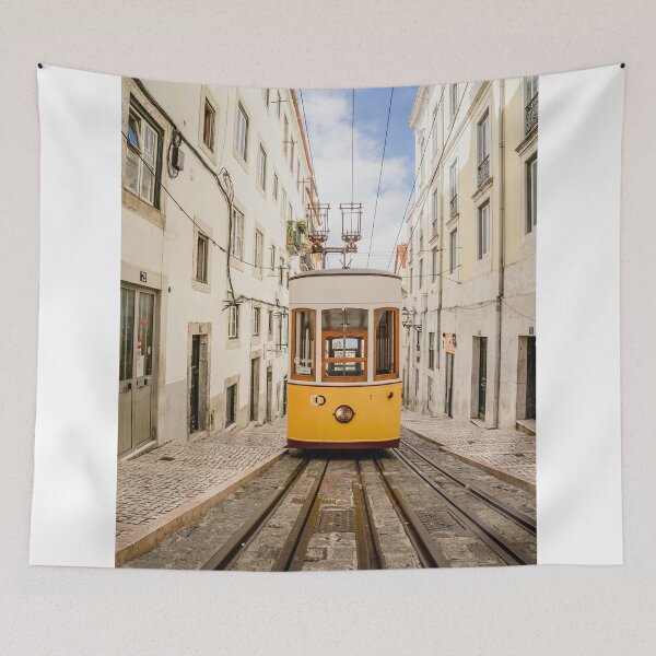 Item preview, Yellow Vintage Tram Ascending Steep Cobblestone Street In Lisbon designed and sold by Laughline.