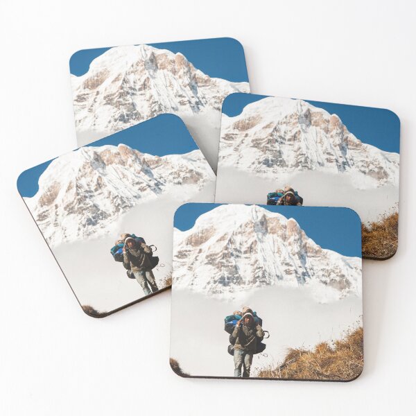 Item preview, Porter Carrying Heavy Backpack Ahead Of Snow Covered Mountain Peak designed and sold by Laughline.