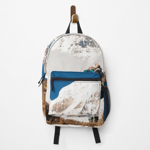 Item preview, Porter Carrying Heavy Backpack Ahead Of Snow Covered Mountain Peak designed and sold by Laughline.