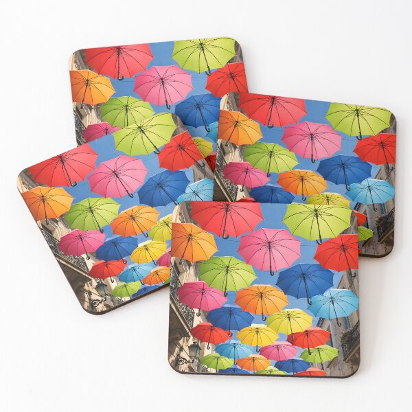 Item preview, Colorful umbrellas floating above a European street designed and sold by homydesign.