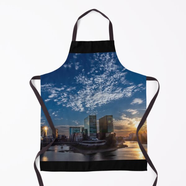 Item preview, Düsseldorf Media Harbour at sunset with sun reflection and small clouds designed and sold by Your Happy Life.