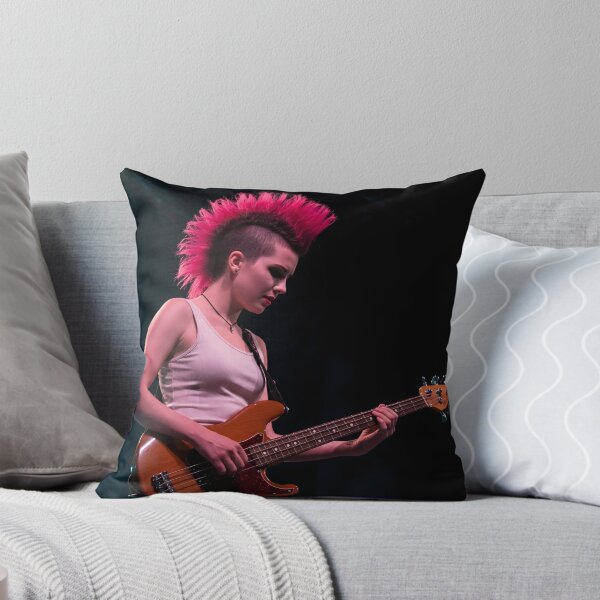 Item preview, A young person with a red mohawk plays a bass guitar on a stage with a dark background designed and sold by homydesign.
