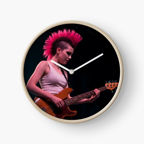 Item preview, A young person with a red mohawk plays a bass guitar on a stage with a dark background designed and sold by homydesign.