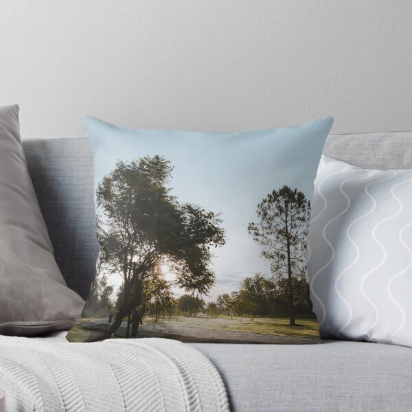 Item preview, Sunlight Streaming Through Park Trees Along Stone Pathway designed and sold by Matricko.