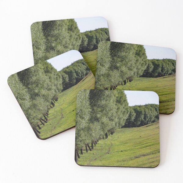 Item preview, Row Of Lush Green Trees Lining Grassy Hillside Slope designed and sold by Matricko.