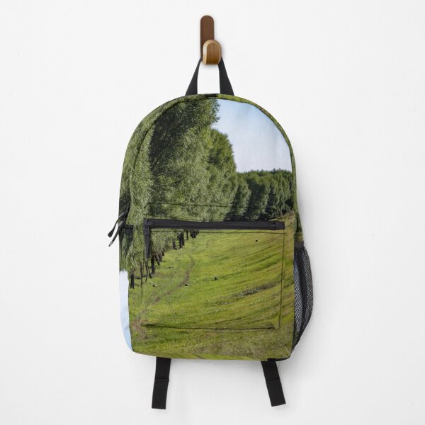 Item preview, Row Of Lush Green Trees Lining Grassy Hillside Slope designed and sold by Matricko.