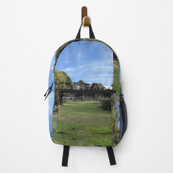 Item preview, Spacious Green Lawn Surrounded By Lush Trees In Urban Park designed and sold by Hutchingse.