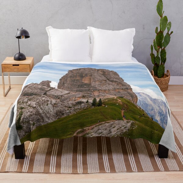 Item preview, Massive Rock Formation Rising Above Green Rolling Hills designed and sold by Hutchingse.