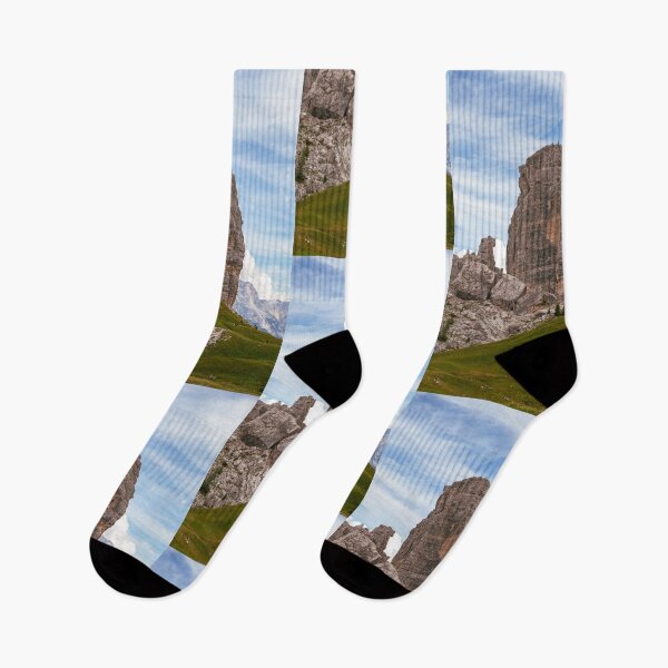 Item preview, Massive Rock Formation Rising Above Green Rolling Hills designed and sold by Hutchingse.