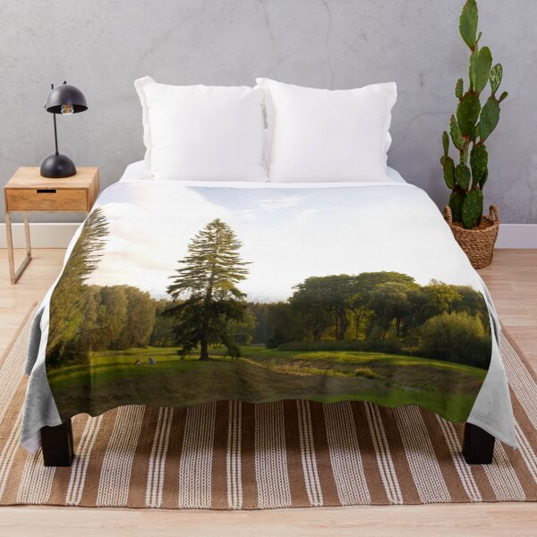 Item preview, Golden Sunlight Illuminating Rolling Forested Hills At Sunset designed and sold by Reillyont.
